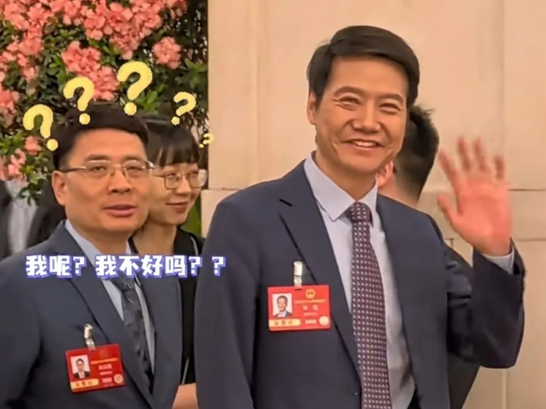 周云杰回应与雷军同走通道,海尔周云杰回应与雷军两会同框